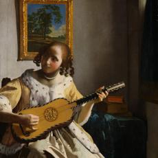 Jeune femme jouant de la guitare de Jan Vermeer